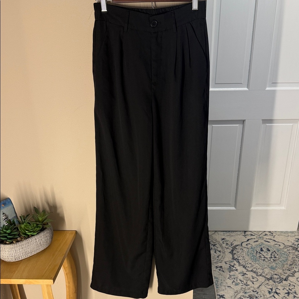 Wide leg black pleated trousers